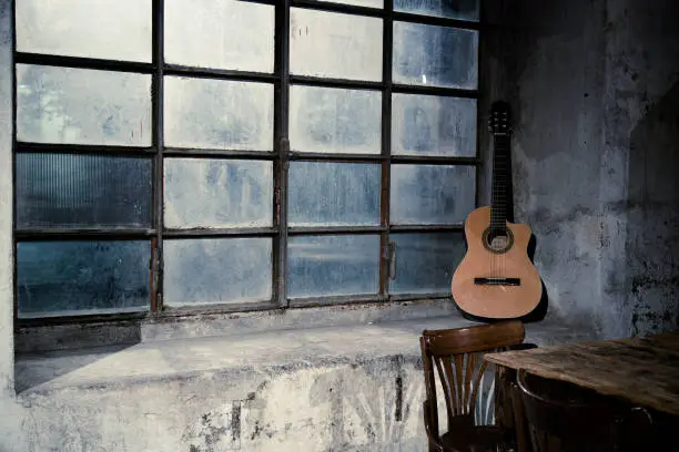Old guitar... vintage location... are you ready to play and sing some success of the past?