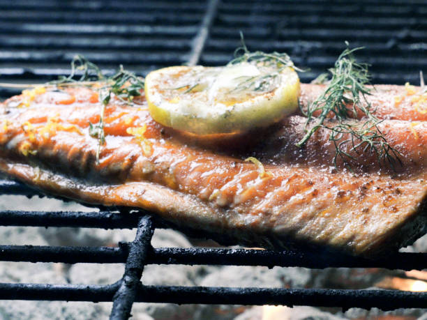 istock Cedar Plank Salmon with Lemon and Herbs 1023775356
