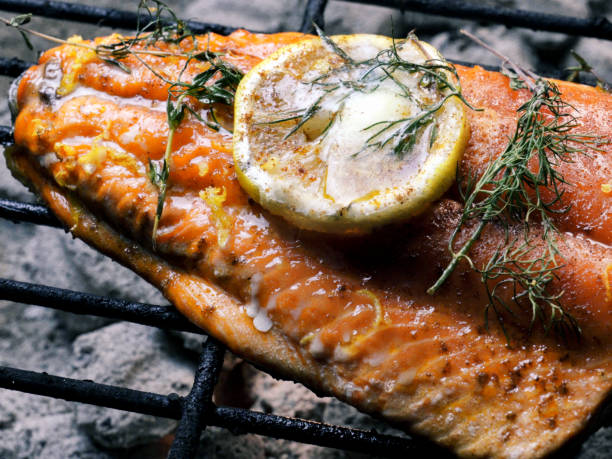 istock Cedar Plank Salmon with Lemon and Herbs 1023775404