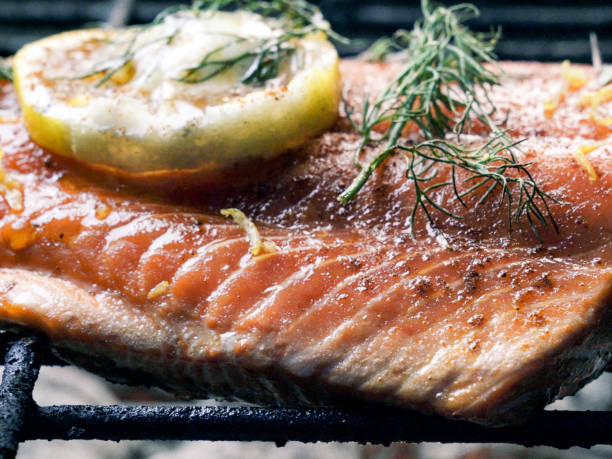 istock Cedar Plank Salmon with Lemon and Herbs 1023775460