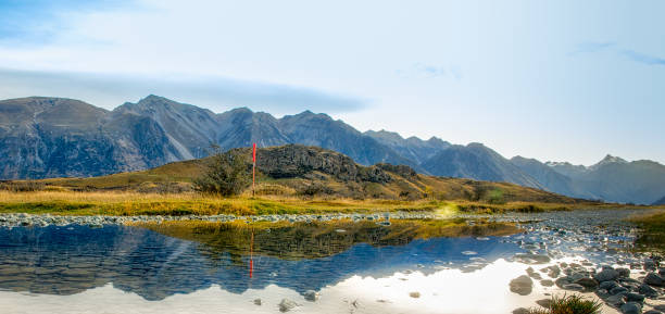 istock Reflections in a high country rain puddle 1023782668