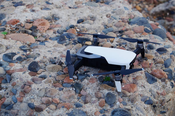 istock drone quadcopter with digital camera on the stone 1023803468