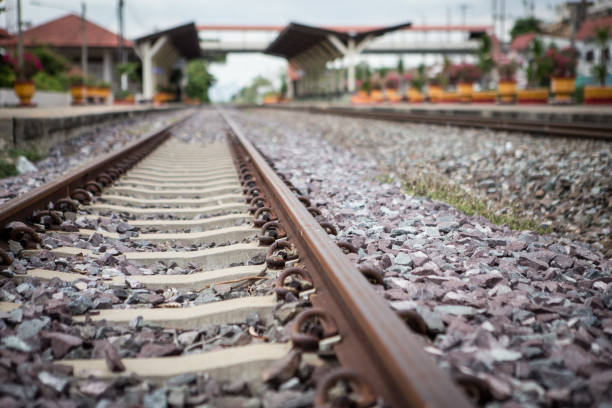 istock railroad tracks and train station in Thailand 1023804534