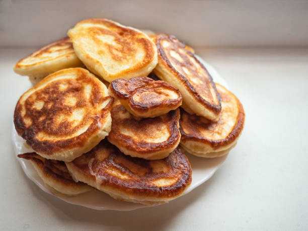 istock a stack of freshly baked fritters on a plate 1023812638