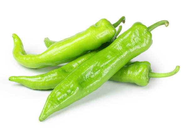 istock Shishito pickle Japapnese peppers pile, paths  on a white background. 1023832136