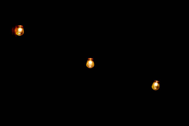 istock Amber Glow of Retro Industrial Edison Style String Lights Bulbs 1023837252
