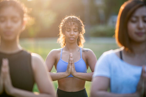 istock Women Meditating Together 1023837614