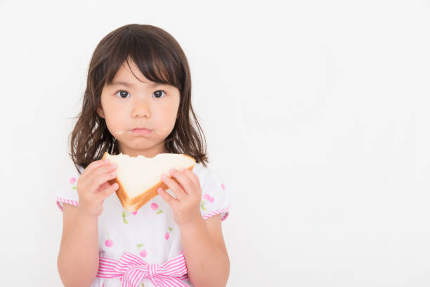 istock little girl on white background 1023837828