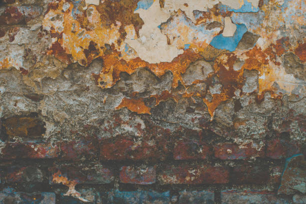 istock Old flaky paint off a grunge cracked wall 1023845252