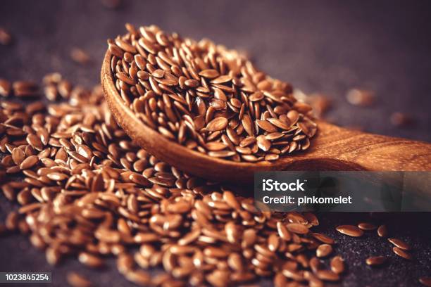 Close Up Flax Seed In Wooden Spoon Super Food With Hight Of A Fiber Nutrient And Anti Inflammatory Omega3 Fatty Acids Stock Photo - Download Image Now