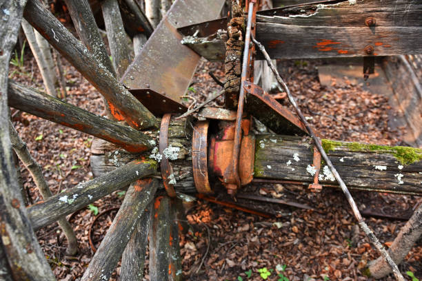 istock Old Decaying Wooden Wagon Wheel 1023867712