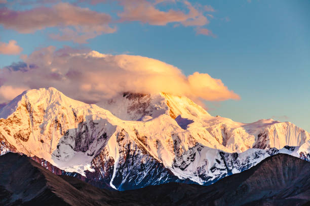 istock Mountain peak in sunset with moonrise for the backgrounds 1023877438