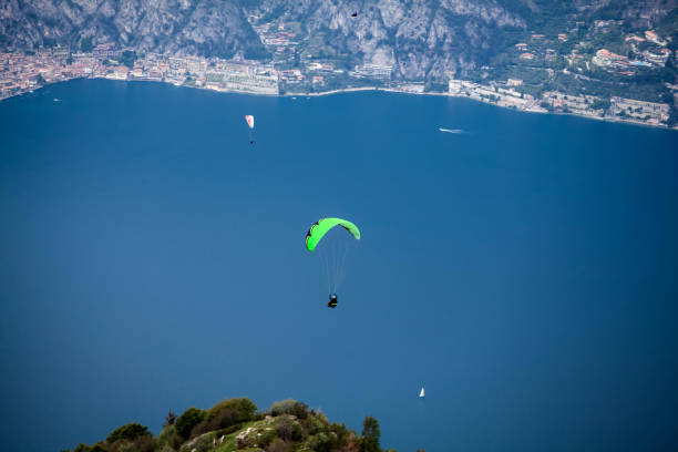 istock Paraglider over lake Garda 1023880388