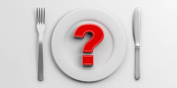 istock Place Setting and red question mark on white background. 3d illustration 1023882660