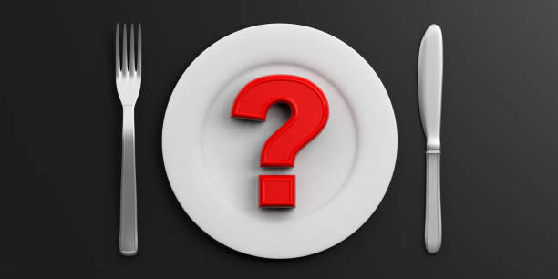 istock Place Setting and red question mark on black background. 3d illustration 1023882672