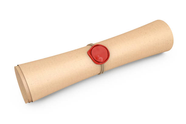 Hand holding diploma with red ribbon around diploma