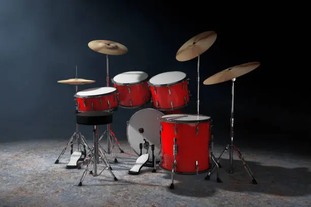 Photo of Professional Rock Red Drum Kit in the Volumetric Light. 3d Rendering