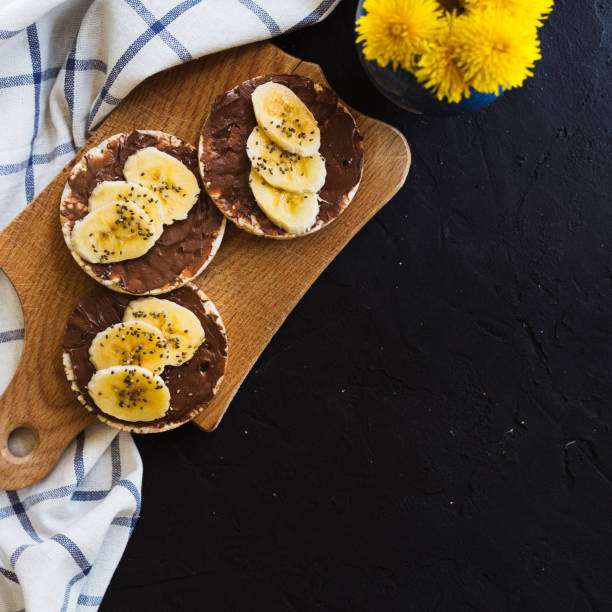 istock Rice cakes breakfast chocolate banana 1023891914