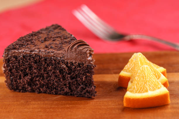 istock Chocolate cake and orange slices. 1023892110