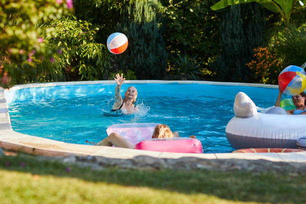 istock Senior Women Pool Fun 1023911906