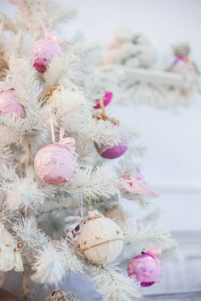 istock A branch of a Christmas tree decorated with ornaments. 1023928254