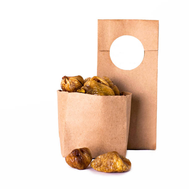 istock Dried figs  in the craft package. 1023934324