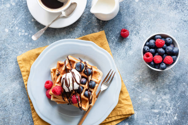 istock Breakfast with belgian waffles and coffee 1023939548