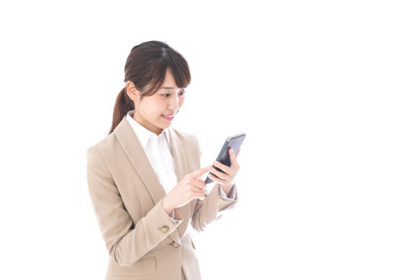 istock Young businesswoman using app 1023945620