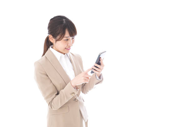 istock Young businesswoman using app 1023945624