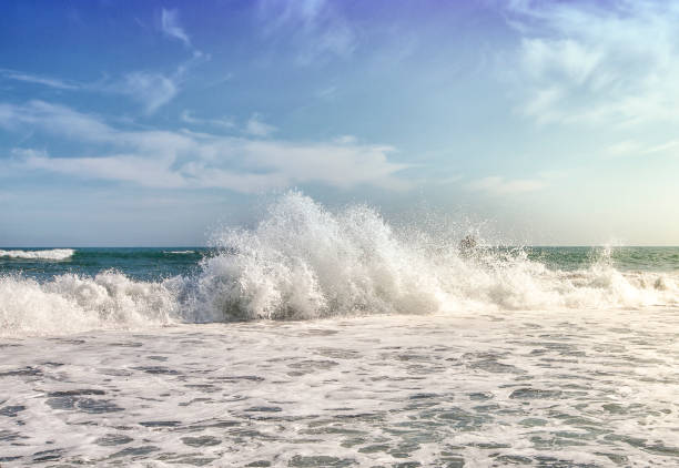 istock Big Ocean Waves  against the blue sky 1023946154