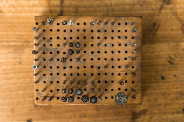 istock Working equipment and tools in a goldsmith workshop on wooden desk as background 1023950972