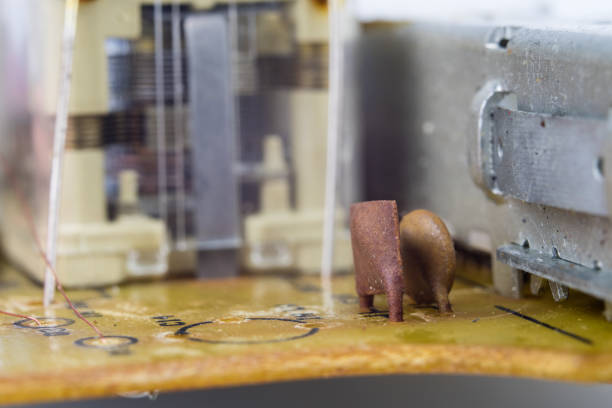 istock Old integrated circuits in an analog radio receiver. Resistors, transistors and other circuits on an old integrated circuit board. Workplace - workshop. 1023955246