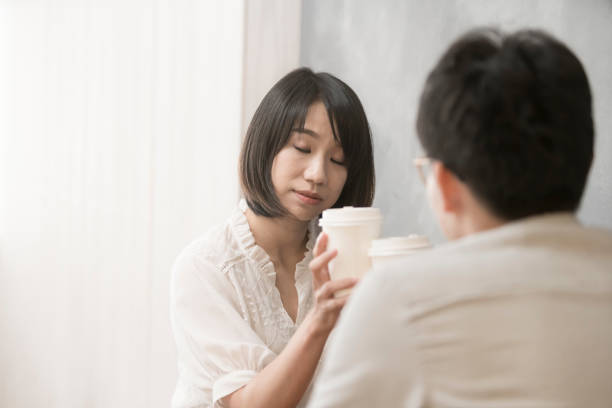 istock the girl is talking to man. 1023963234