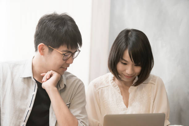 istock the girl is talking to man. 1023964138