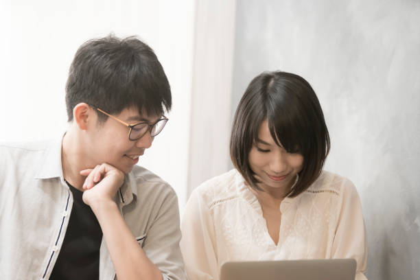 istock the girl is talking to man. 1023964164