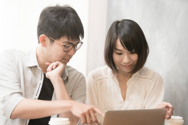 istock the girl is talking to man. 1023964682