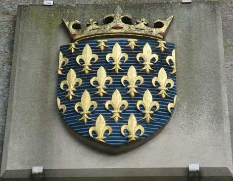 Crown and lily fleur-de-lis on a facade  French monarchy