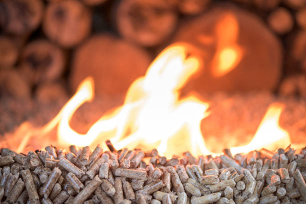 istock Wooden pellets in flames 1023967072