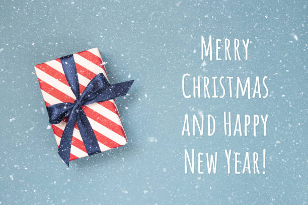 istock Christmas card with gift box. 1023981626
