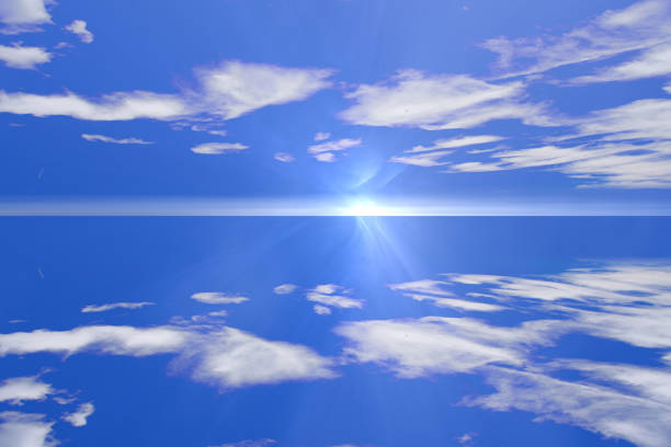 Sky and Water. Shining light at the horizon