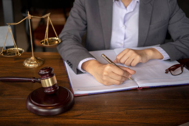 istock lawyer working on a documents, judge gavel 1024023658