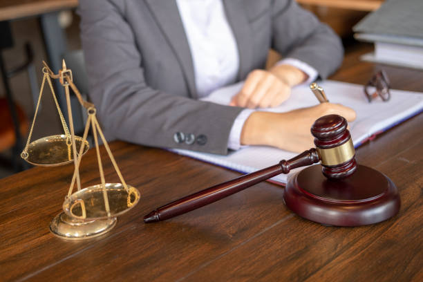 istock lawyer working on a documents, judge gavel 1024023718