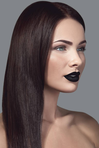 istock Beautiful woman with black lipstick 1024024148