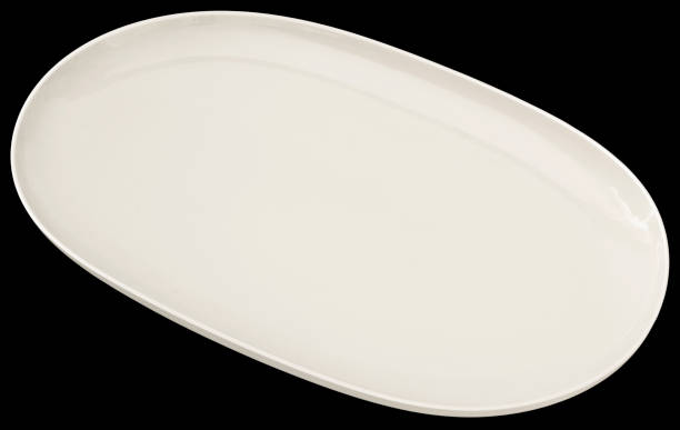istock White Porcelain Platter Isolated on Black Background 1024029170