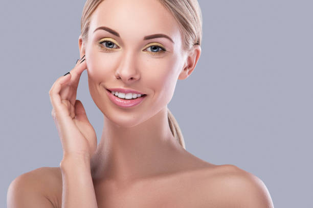 istock Beautiful blonde woman with bright makeup 1024029274