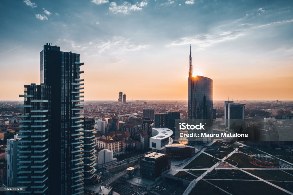 Amazing view of cityscape at sunset in a summer day Skyscraper at sunset in Milan Milan Stock Photo