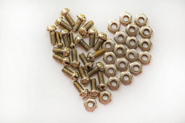 istock Bolts and nuts in the form of heart. 1024036430