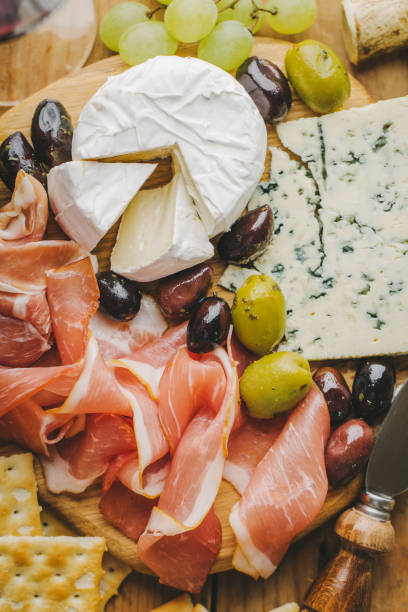 istock Mediterranian appetizers on old wooden table 1024040126