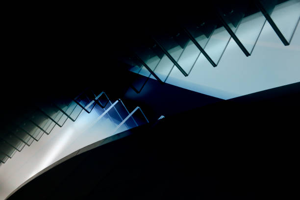 istock Digitally rendered modern or futuristic architecture fragment resembling glass balustrade glowing in darkness. Unusual abstract architectural or industrial background in hi-tech style. 1024044904