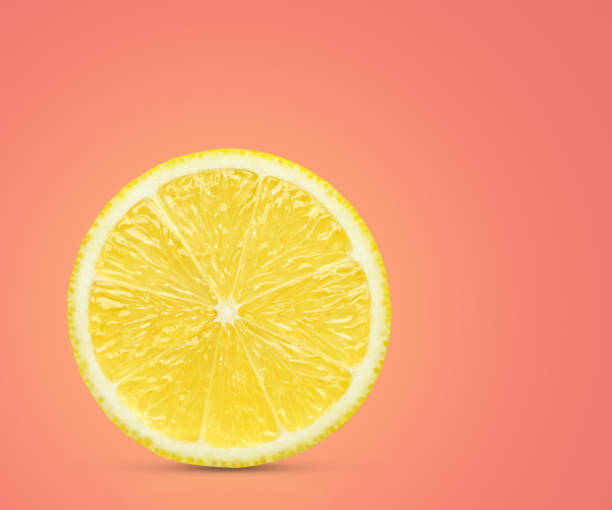 istock Perfect yellow lemon slice on green with clipping path 1024044984